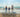 Picture of a family of three on beach.