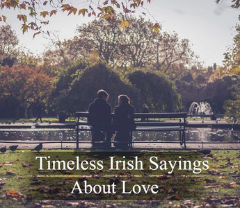 A couple sitting on bench in Dublin.