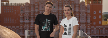 Man and woman wearing unisex t-shirts with architectural prints.