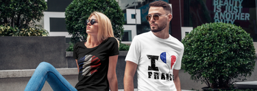 
Man and woman wearing t-shirts with French prints, styled casually to showcase chic, French-inspired designs for a fashionable, cultural look.